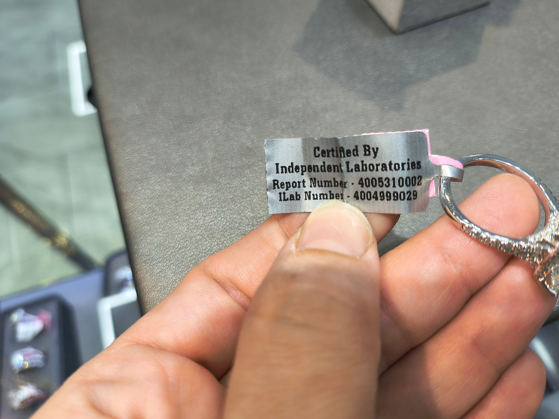 Independent Laboratories certification tag for lab grown diamond ring