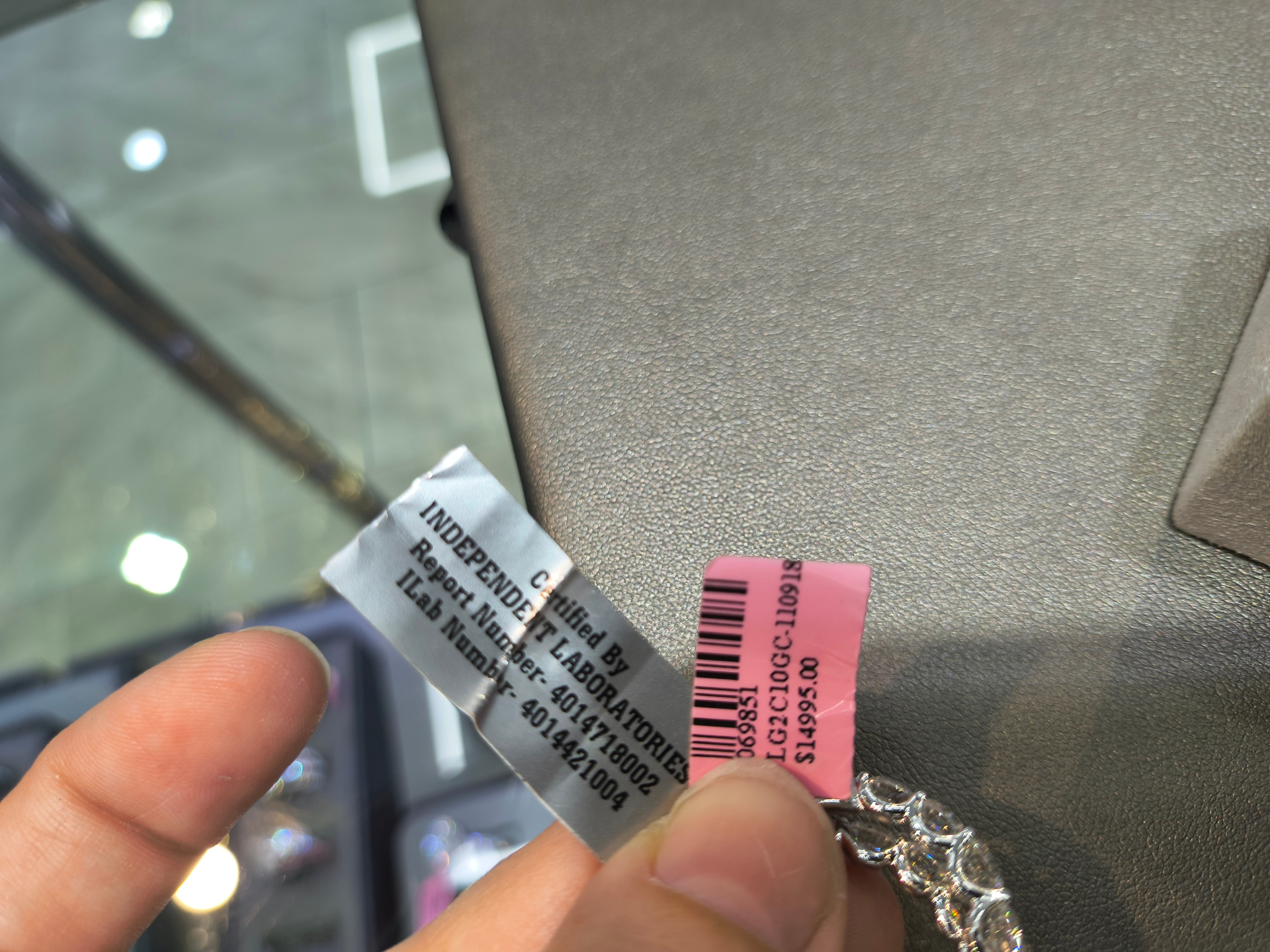 Certification tag from Independent Laboratories for the white gold diamond ring